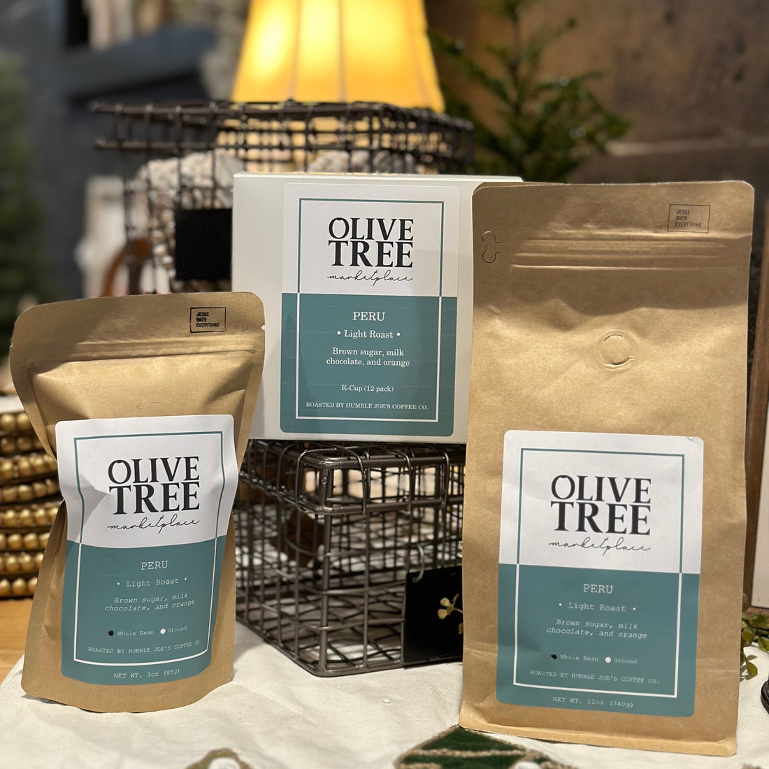OTM single origin coffee bags on a wooden counter