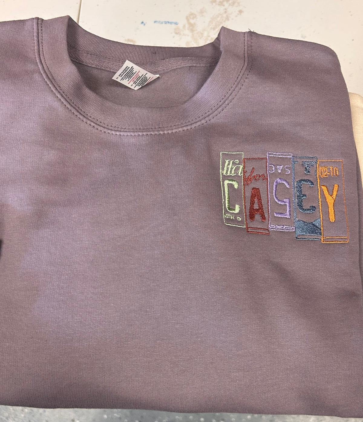 Casey License Plate Embroidered Crewneck