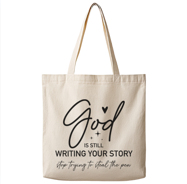 God Is Still Writing Your Story – Canvas Tote Bag